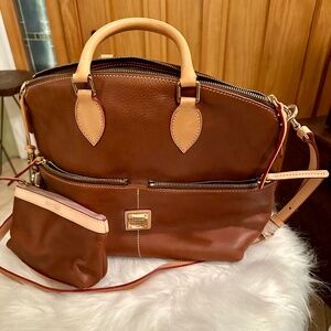 Dooney and Burke purse. Brown with cosmetic bag